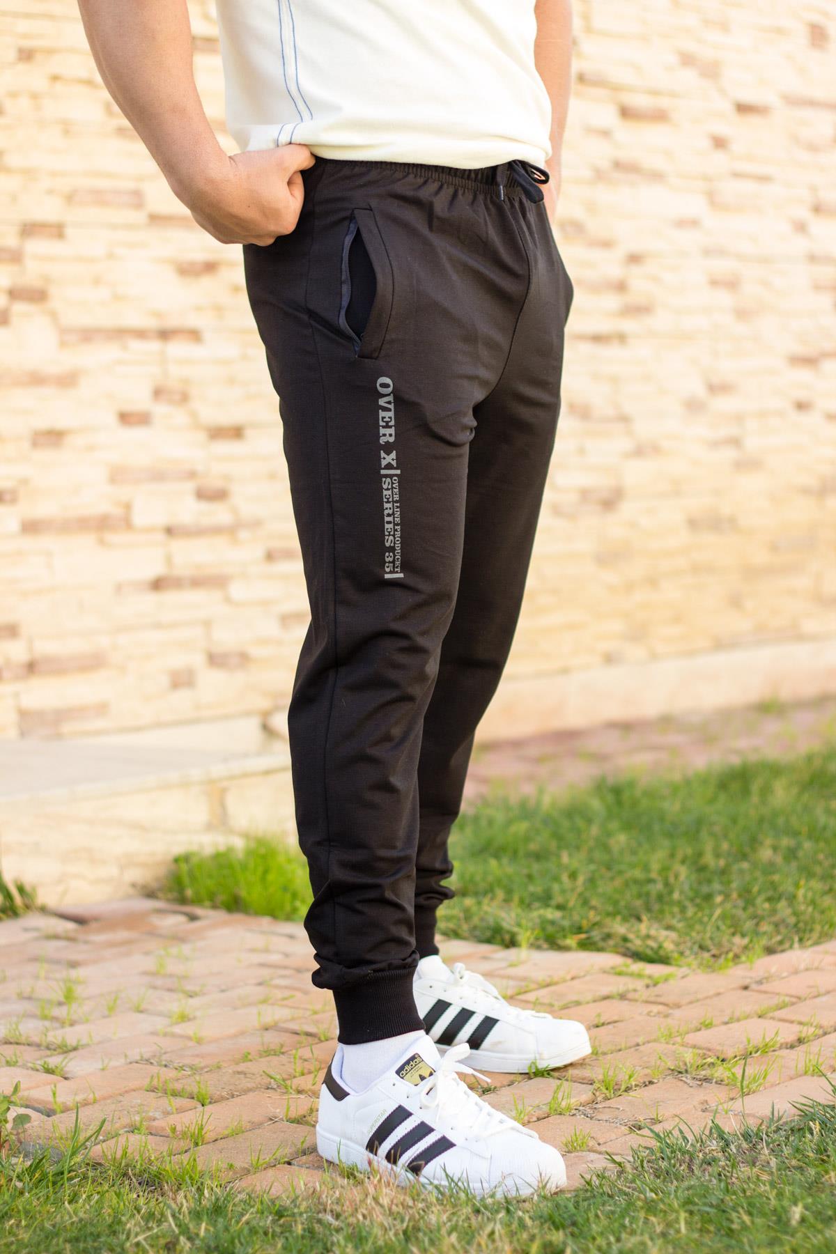 Erkek Siyah Penye Bilek Ribana Lastikli Gizli Fermuarlı İpli Eşofman Altı 21EESAOVER